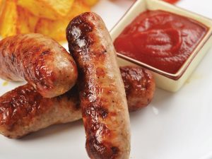 Cooked sausages with tomato ketchup