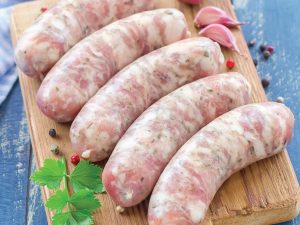 Uncooked sausages.