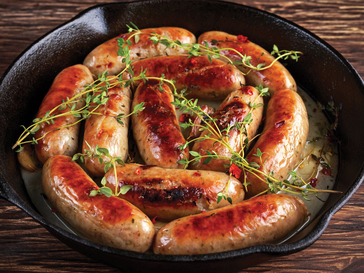 Cooked sausage with tomato ketchup image