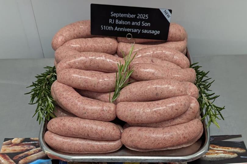 A home economist prepares sausage products for tasting as part of the UKSW judging process.
