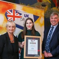 Best Independent Butcher North West Innovative Sausage: L-R: Host Lesley Waters with winner Matilda Penney of Baker & Roberts Craft Butchers with category partner Nick Allen of BMPA