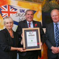 Best Independent Butcher East Midlands Traditional Sausage: L-R: Host Lesley Waters with winner Richard Taylor of Owen Taylor & Sons with category partner Norman Bagley of AIMS