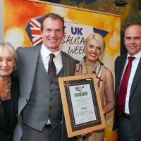 Best Independent Butcher West Midlands Traditional Sausage: L-R: Host Lesley Waters with winners Darren and Lauren Morgan of Morgan's Country Butchers with category partner Graeme Rolinson of Marel