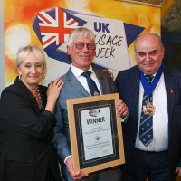 Best Independent Butcher South West Traditional Sausage: L-R: Host Lesley Waters with winner Steve Cook of Walter Rose & Son with category partner The Master of The Worshipful Company of Butchers