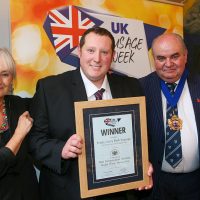 Best Independent Butcher South West Innovative Sausage: L-R: Host Lesley Waters with winner Chris Potter of Tim Potter Son and Daughter with category partner The Master of The Worshipful Company of Butchers