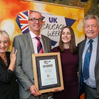 Best Butcher Wales Innovative Sausage: L-R: Host Lesley Waters with winners Paul Robley and Laura Jones of Edwards of Conwy with category partner Keith Fisher of The Institute of Meat