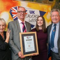 Best Butcher Wales Innovative Sausage: L-R: Host Lesley Waters with winners Paul Robley and Laura Jones of Edwards of Conwy with category partner Keith Fisher of The Institute of Meat
