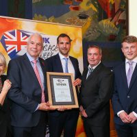 Best Manufacturer/Own Brand Traditional Sausage: Host Lesley Waters with winners Grant Powter, Tristan Powter and Tony Tuite of Powters with category partner Harry Bosse of Bosse Interspice
