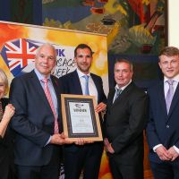 Best Manufacturer/Own Brand Traditional Sausage: Host Lesley Waters with winners Grant Powter, Tristan Powter and Tony Tuite of Powters with category partner Harry Bosse of Bosse Interspice