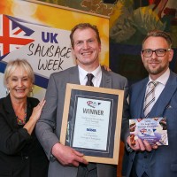 UK Supreme Sausage Champion: L-R: Host Lesley Waters with winner Darren Morgan of Morgan's Country Butchers with category partner Richard Watson of Reiser